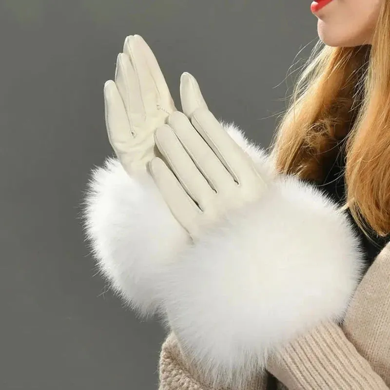 Gloves made of natural sheepskin with natural fur on a warm fluffy lining