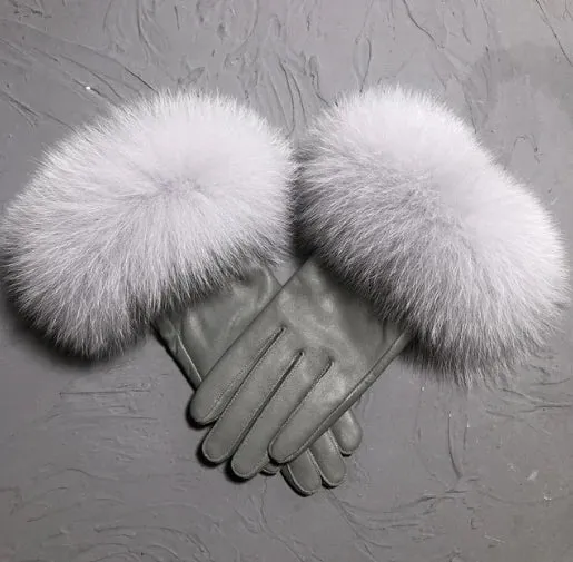 Gloves made of natural sheepskin with natural fur on a warm fluffy lining