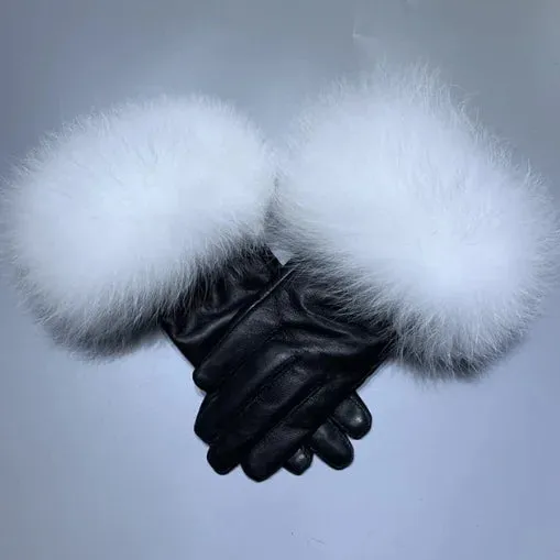 Gloves made of natural sheepskin with natural fur on a warm fluffy lining