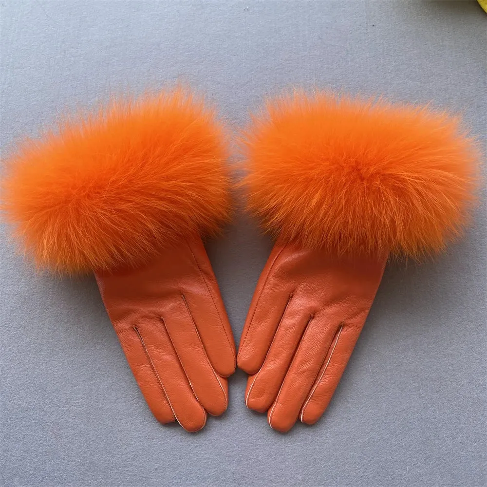 Gloves made of natural sheepskin with natural fur on a warm fluffy lining