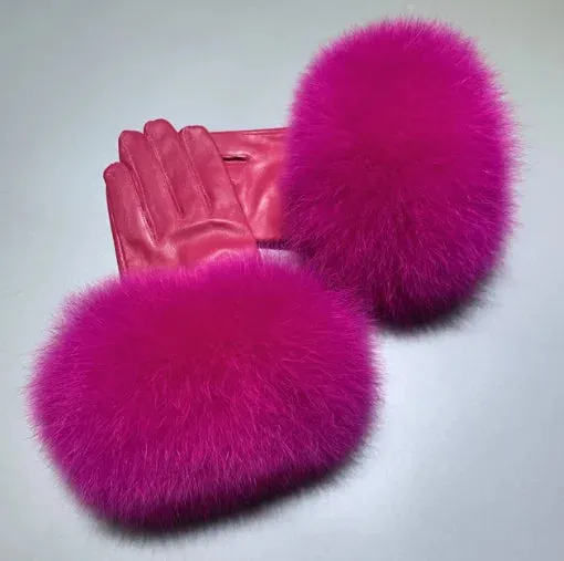 Gloves made of natural sheepskin with natural fur on a warm fluffy lining