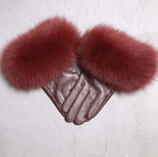 Gloves made of natural sheepskin with natural fur on a warm fluffy lining