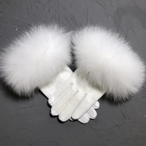 Gloves made of natural sheepskin with natural fur on a warm fluffy lining