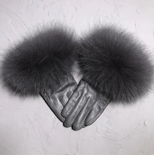 Gloves made of natural sheepskin with natural fur on a warm fluffy lining